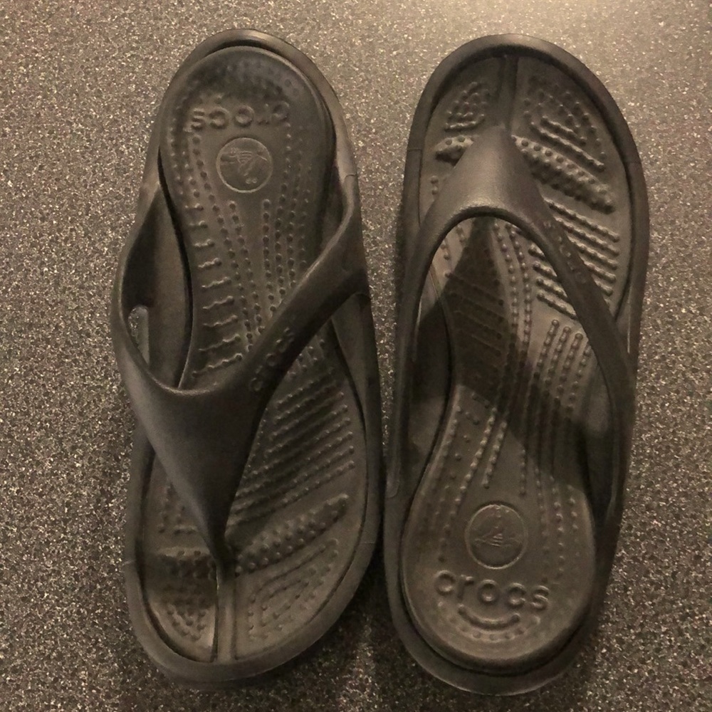 Very lightly worn size 13 Crocs Flip Flops. Black.